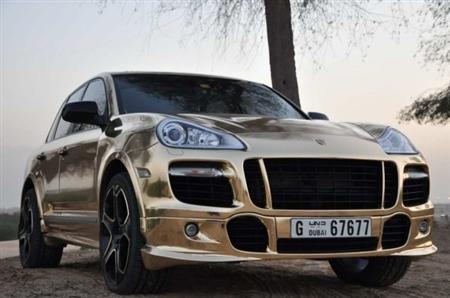  we got an email with pictures of a gold Porsche Cayenne