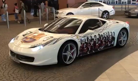 On the white 458 Italia you will spot numerous FC Barcelona decals 