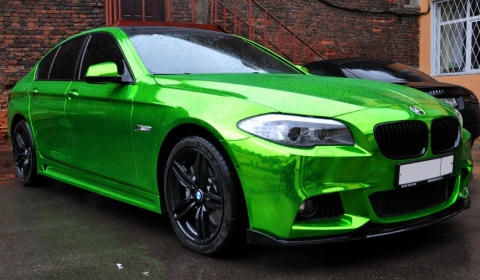 This is a BMW F10 550i wrapped in a chrome green vinyl
