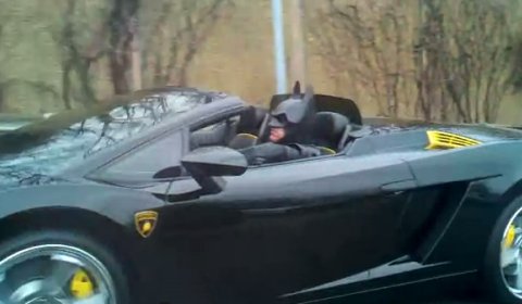 The superhero was driving his black Lamborghini Gallardo Spyder with yellow